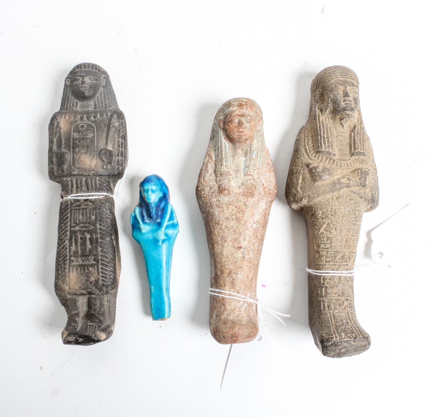 A Group of Four Egyptian Ushabti Height of tallest 6 1/2 inches.