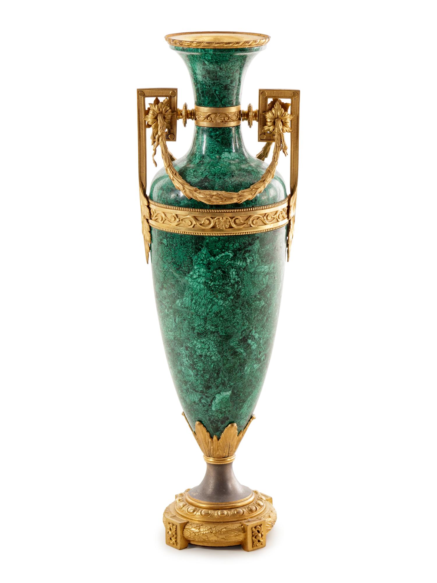 A Louis XVI Style Gilt Metal Mounted Malachite Veneered Urn