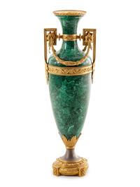 A Louis XVI Style Gilt Metal Mounted Malachite Veneered Urn