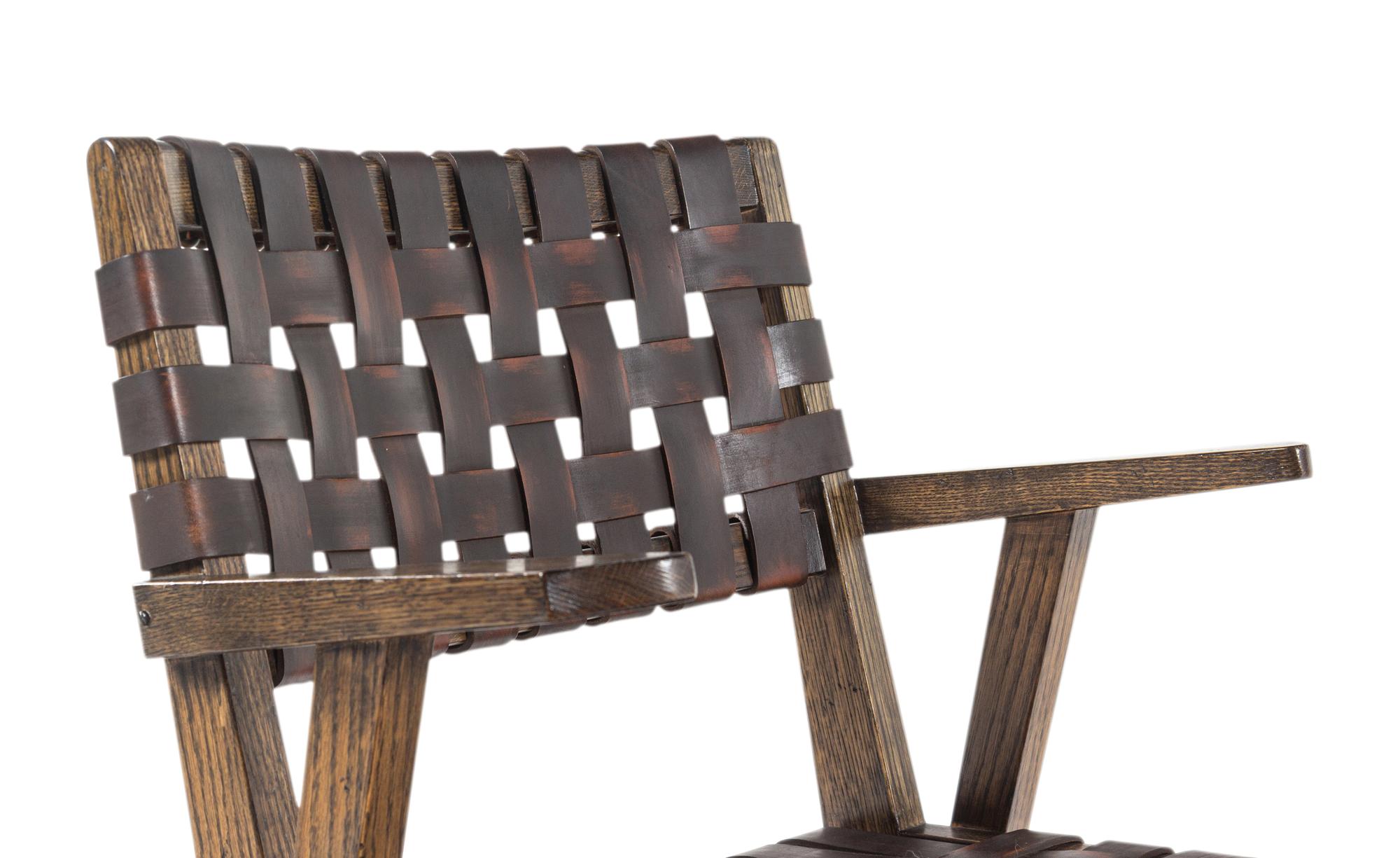 A Set of Four Contemporary Oak and Leather Armchairs