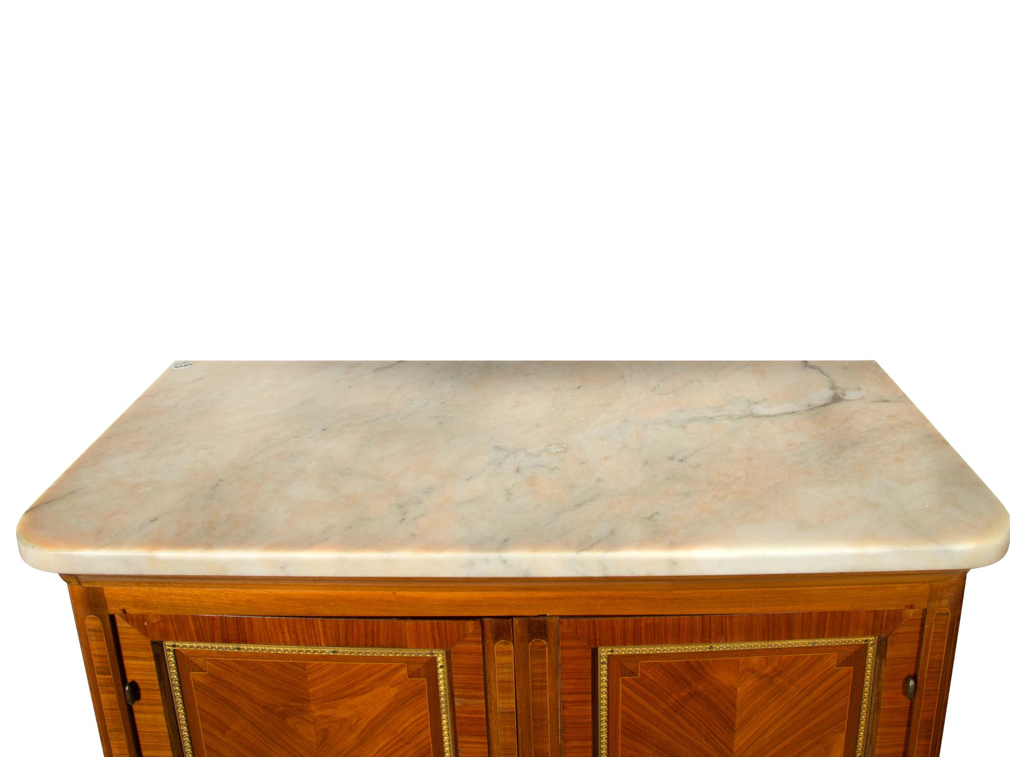 A Louis XVI Style Gilt Bronze Mounted Tulipwood Marble-Top Cabinet
