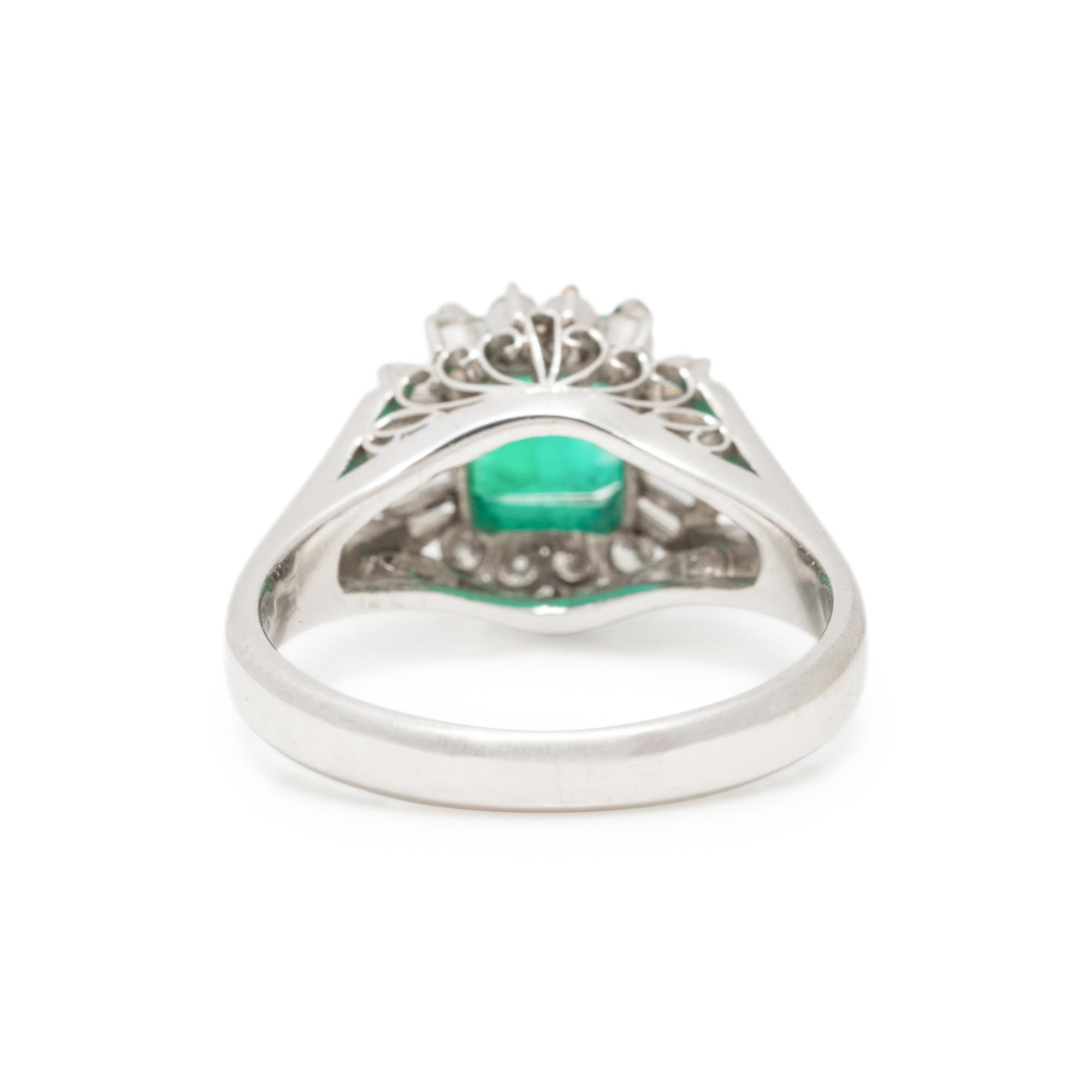 PLATINUM, EMERALD, AND DIAMOND RING