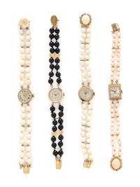 COLLECTION OF BEADED BRACELET WATCHES