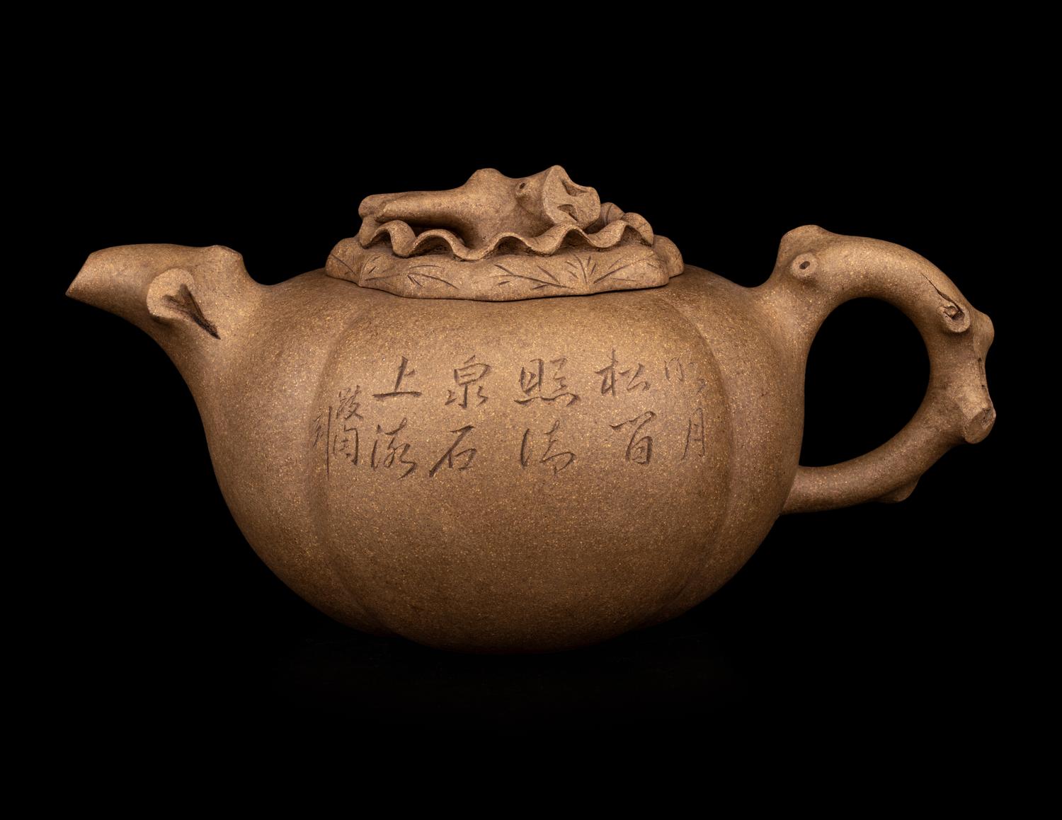 A Chinese Yixing Zisha Pottery Teapot
