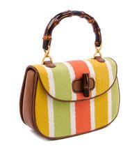 A Gucci Brown Leather and Woven Bamboo Top Handle Handbag, 10.5" x 7" x 3".