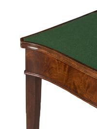A Pair of George III Mahogany Games Tables