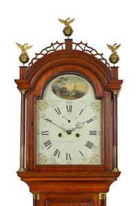 An American Mahogany Brass-Mounted, Inlaid and Carved Mahogany Tall Case Clock