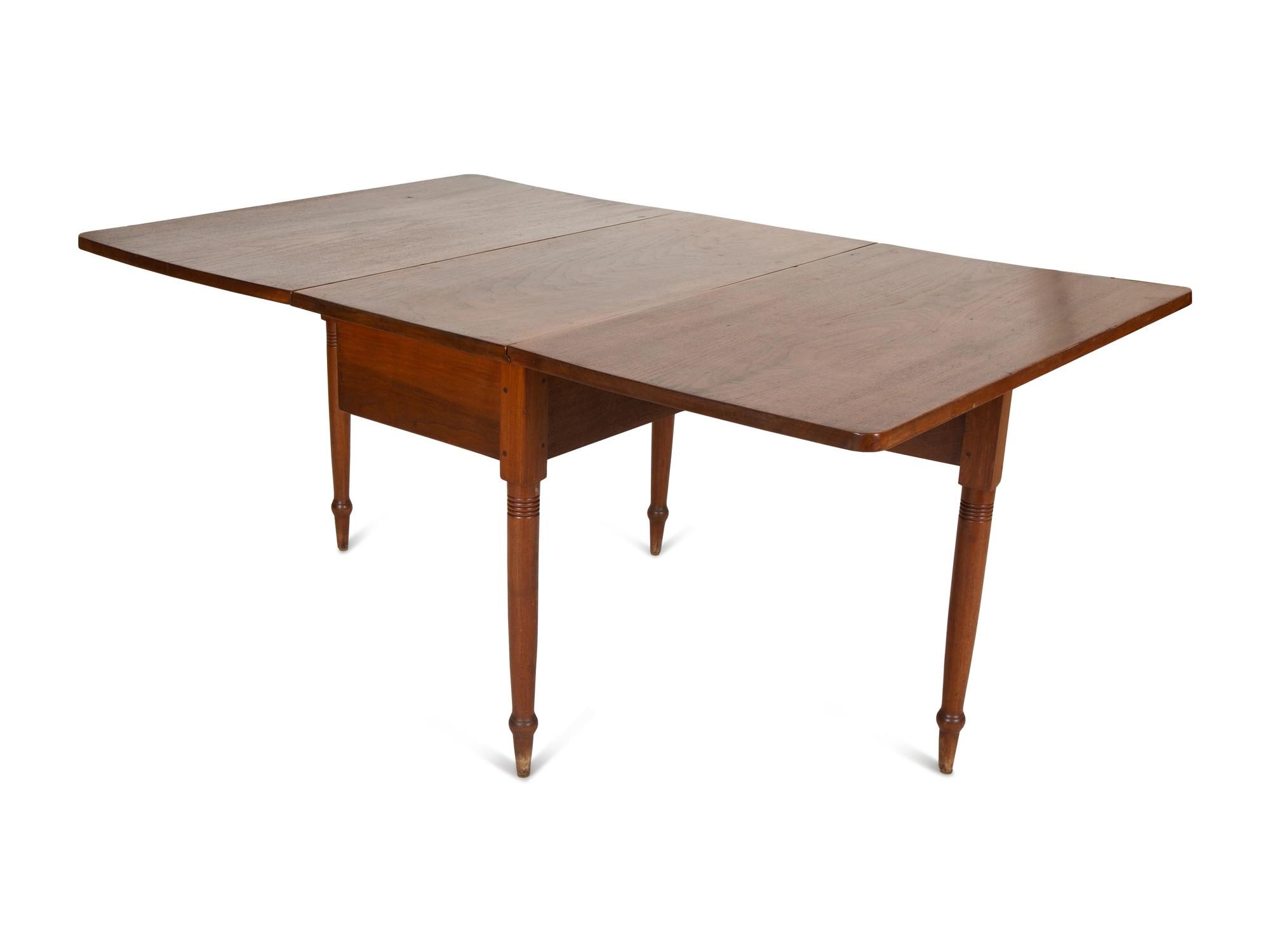 An American Mahogany Drop Leaf Dining Table