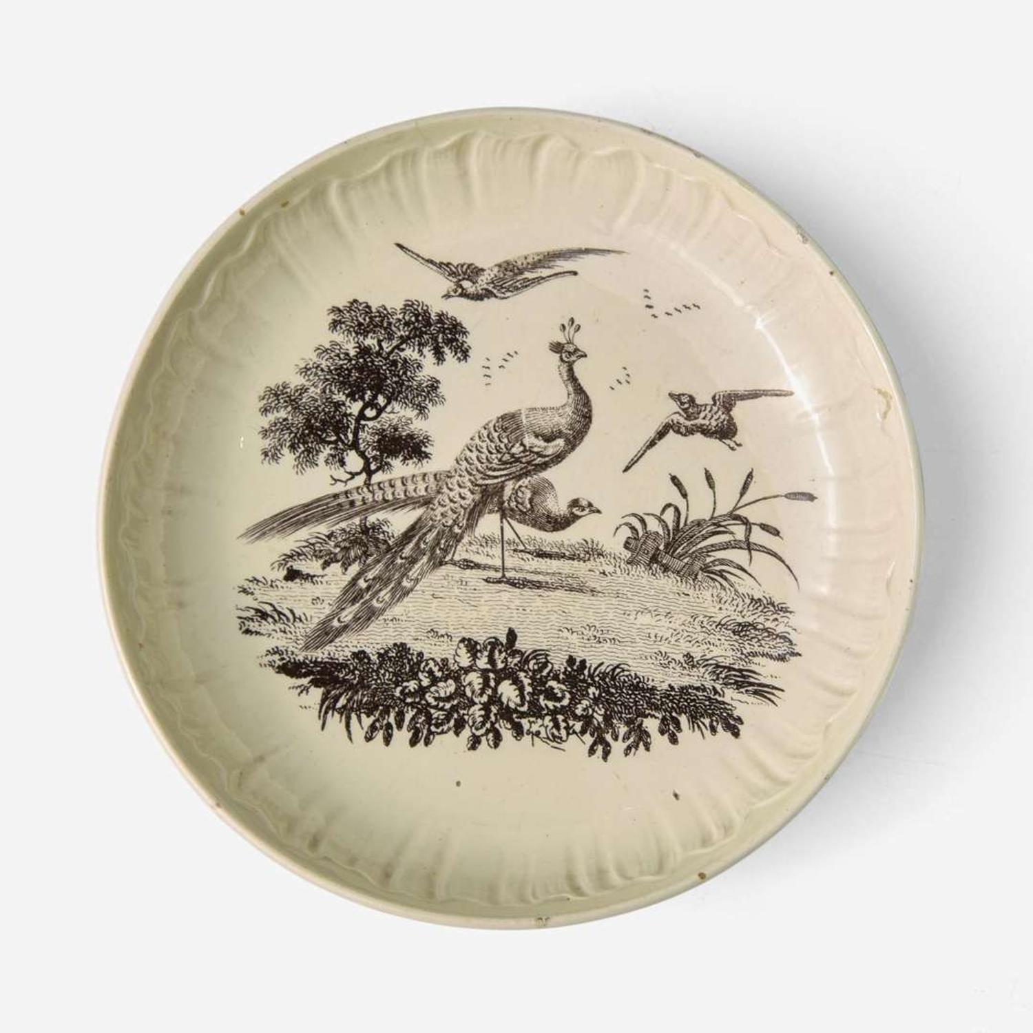 A Wedgwood Queensware Shell Edge Cup and Saucer with Exotic Birds Decoration UK, 1770s