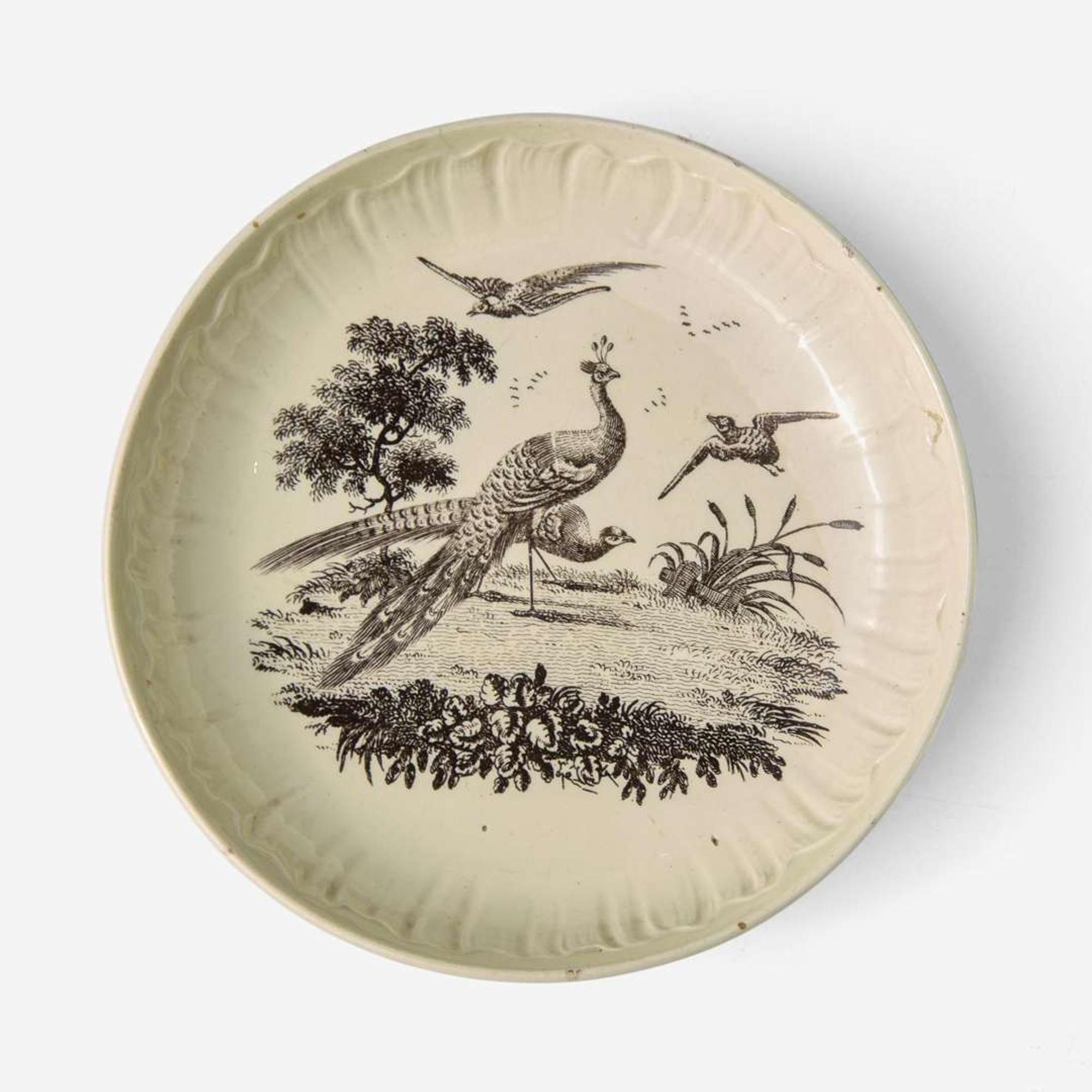 A Wedgwood Queensware Shell Edge Cup and Saucer with Exotic Birds Decoration UK, 1770s