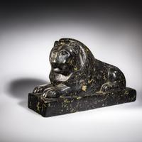 An Egyptian Black Marble Recumbent Lion