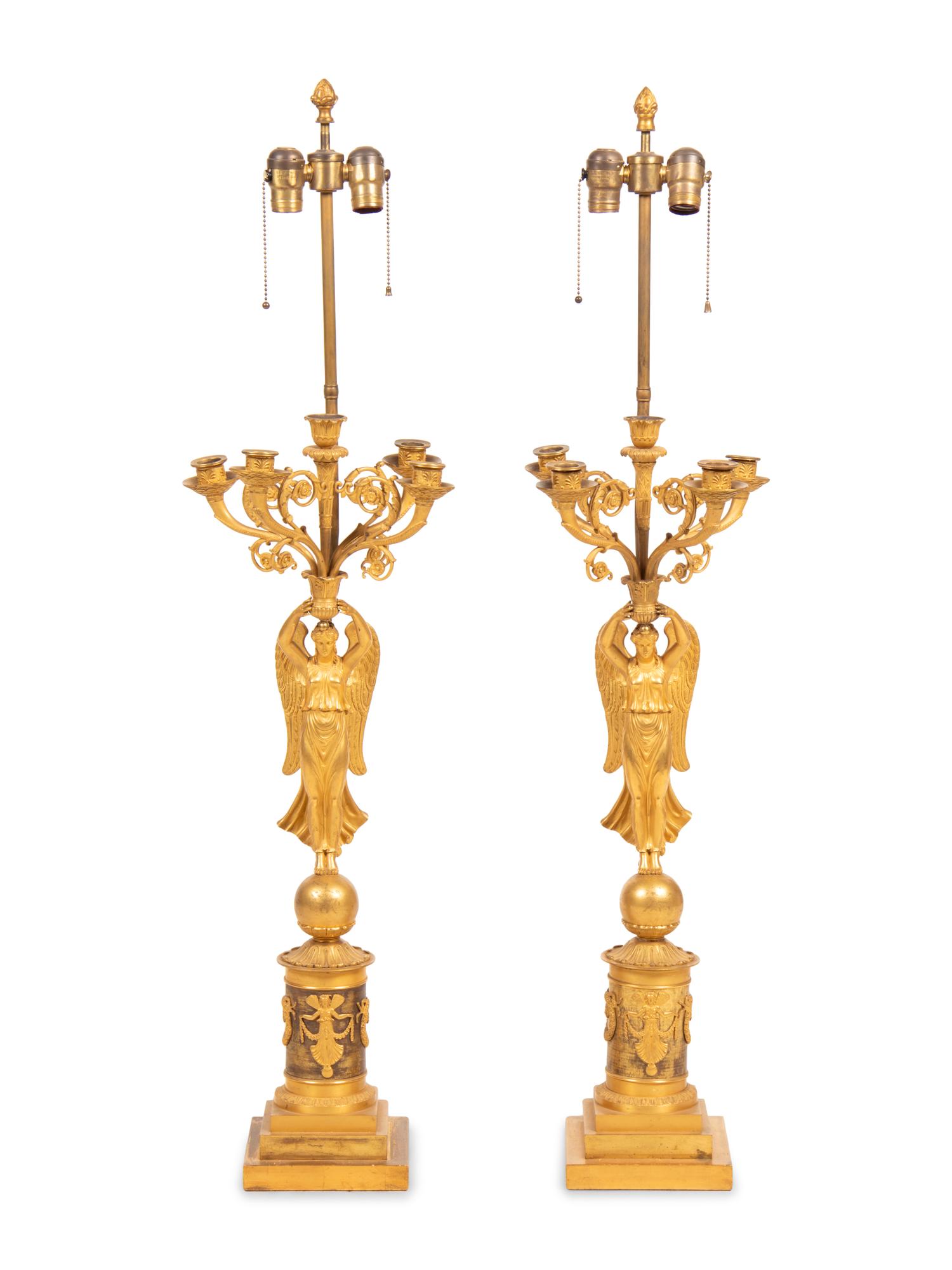 A Pair of Empire Style Gilt Bronze Figural Candelabra
