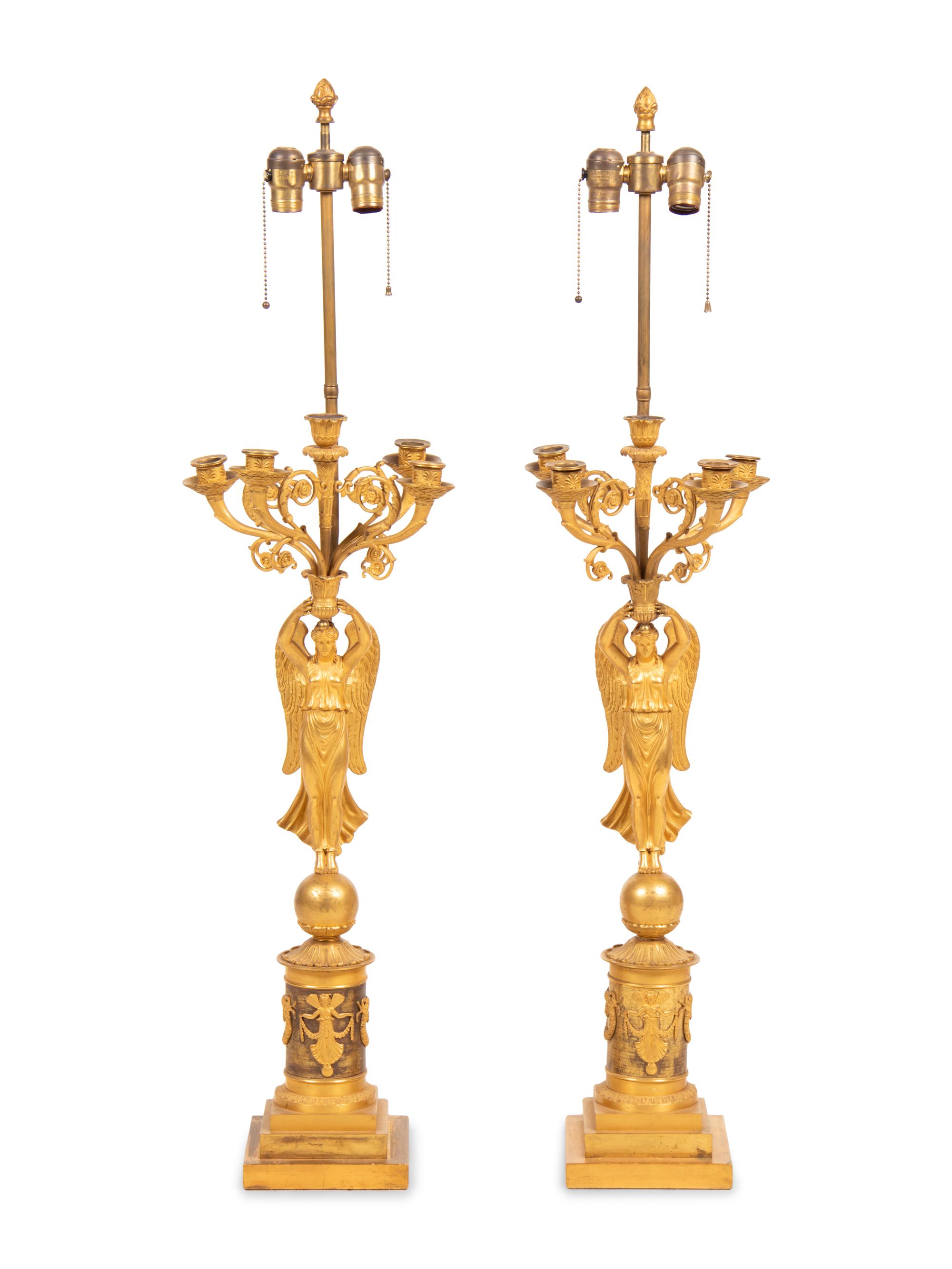 A Pair of Empire Style Gilt Bronze Figural Candelabra