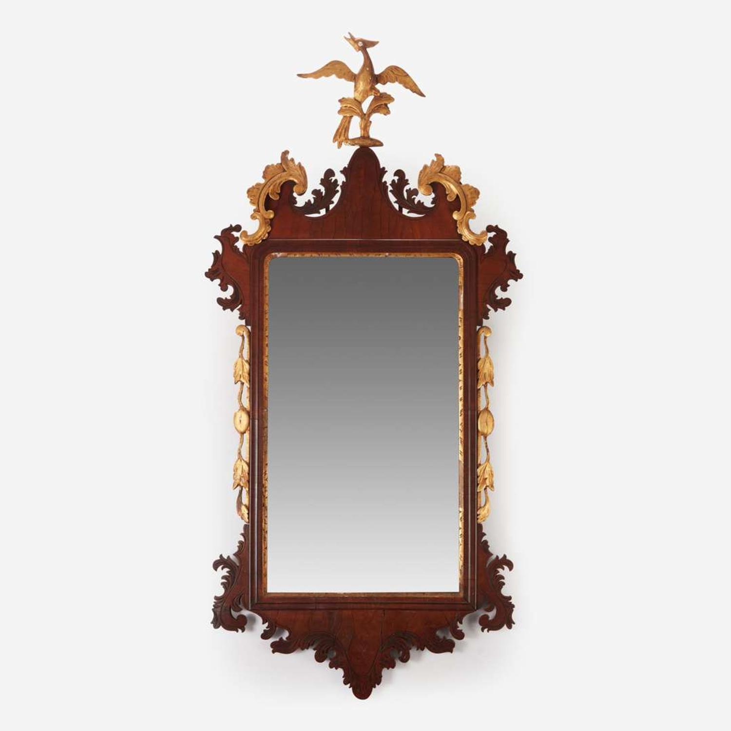 A Chippendale fret-carved mahogany and parcel-gilt looking glass 18th / 19th century