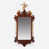 A Chippendale fret-carved mahogany and parcel-gilt looking glass 18th / 19th century