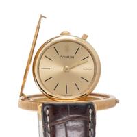 CORUM, 18K YELLOW GOLD HIDDEN DIAL COIN WATCH