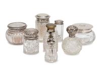 A Group of Six Silver or Brass Capped Glass Bottles and Two Silver Top Powder Jars — 20TH CENTURY
