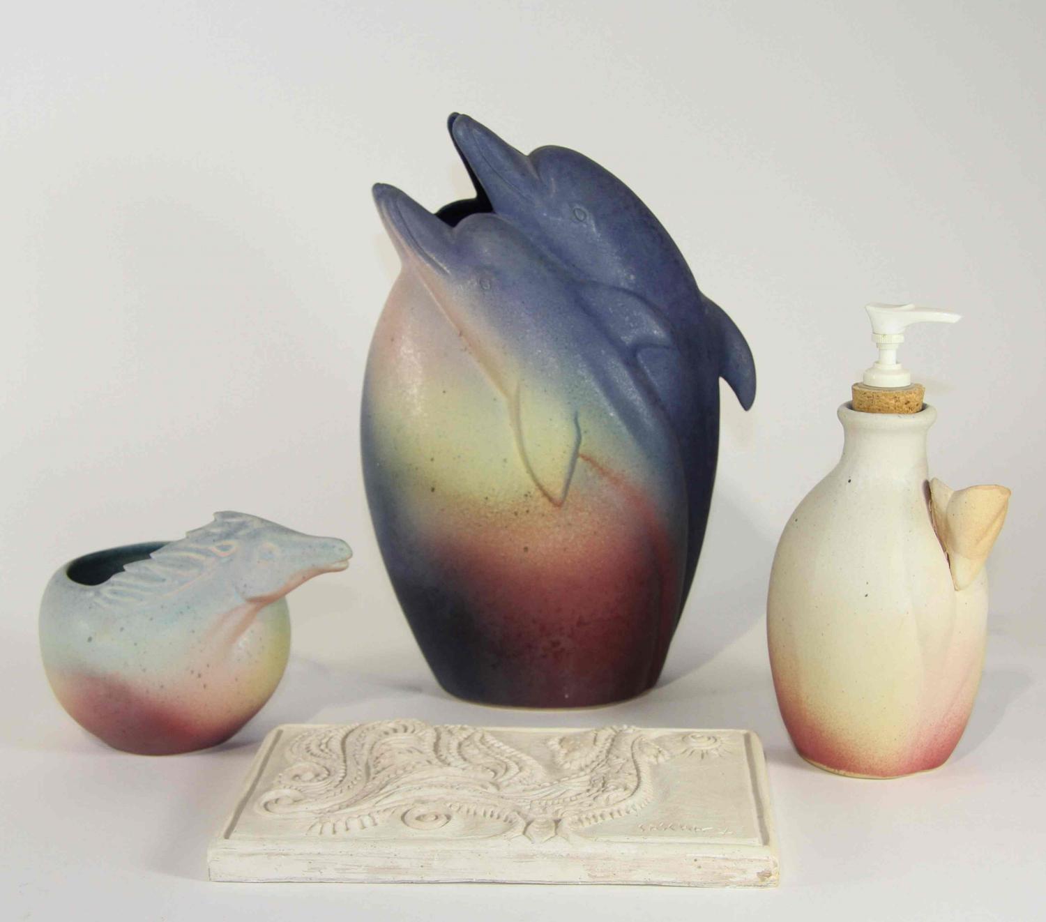 A Group of Four Pottery Articles Height of tallest 11 1/2 inches.