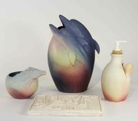 A Group of Four Pottery Articles Height of tallest 11 1/2 inches.