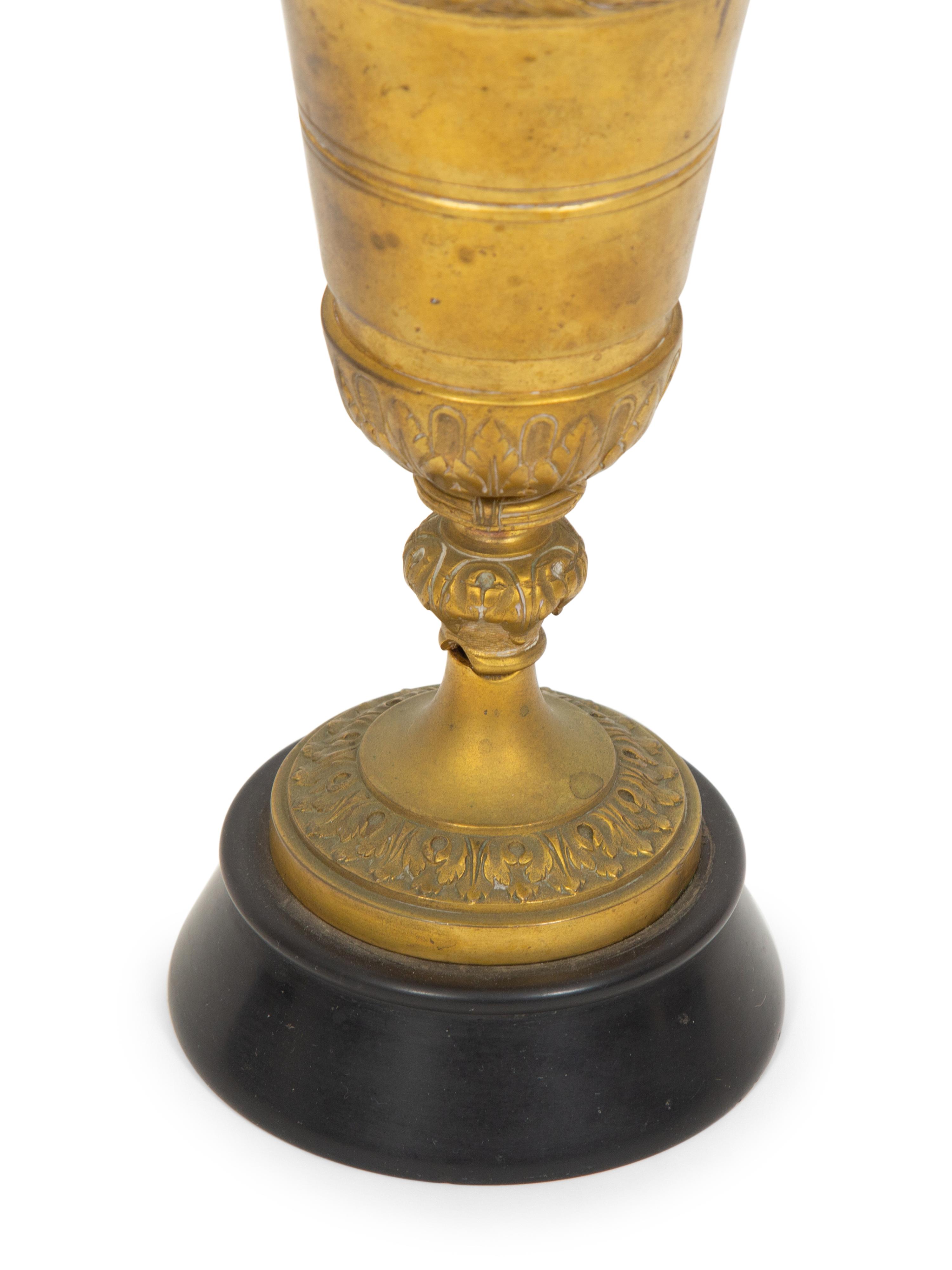 A Near Pair of French Gilt Bronze Floral Three-Light Candelabra