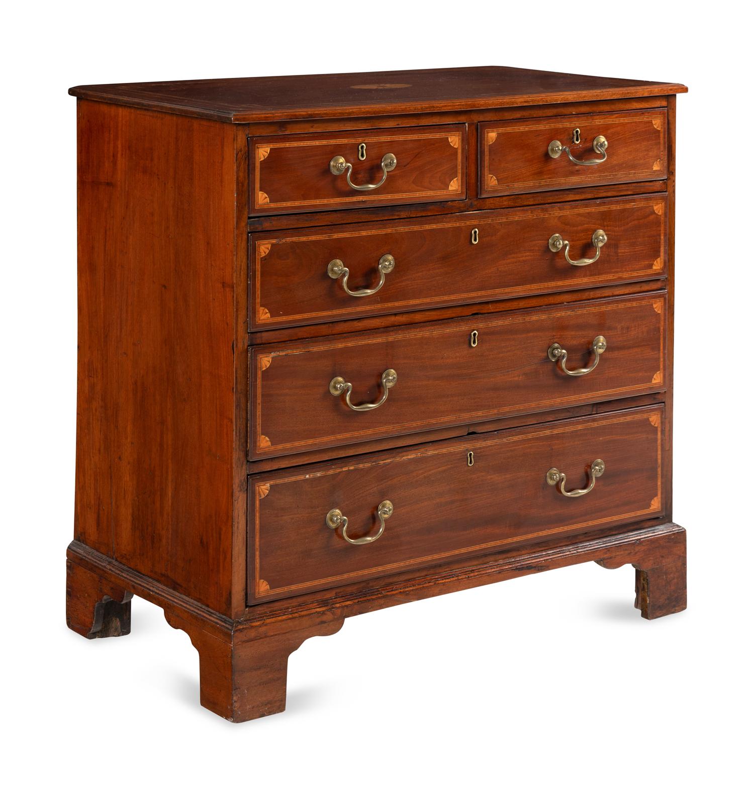 An English Mahogany and Marquetry Chest of Drawers