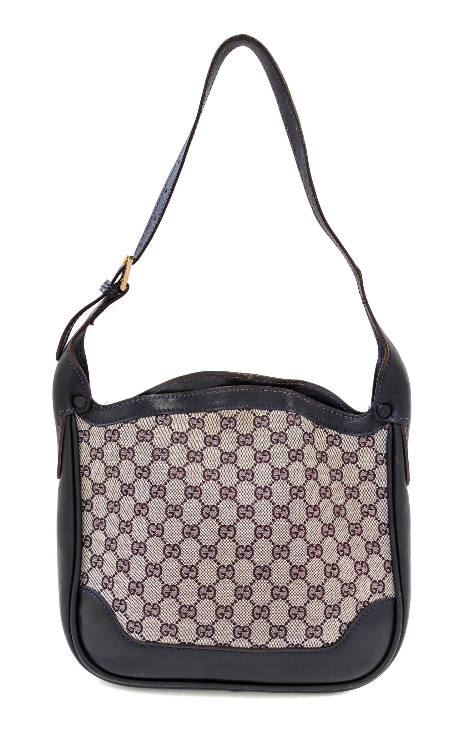 A Gucci Blue Monogram Shoulder Bag, 11" x 9.5" x 3"; Strap drop: 10".