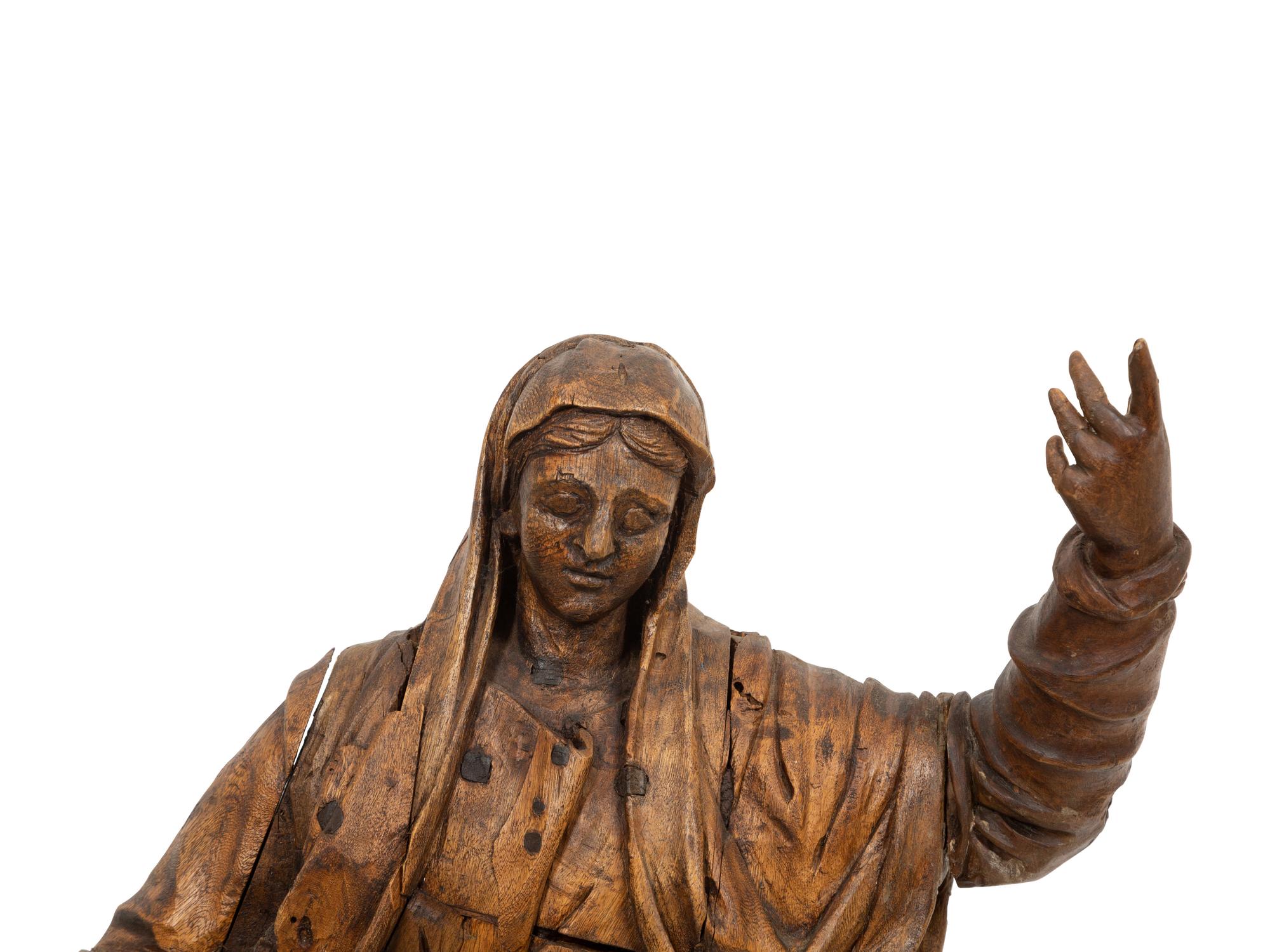 A Continental Carved Pine Figure of Female Saint