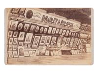 [EARLY PHOTOGRAPHY]. Cabinet card of an advertising display for BRADLEY & RULOFSON at an exhibit.