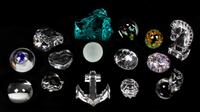 A Collection of Fifteen Glass Paperweights Height of tallest 5 inches.