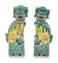 A Pair of Chinese Porcelain Guardian Lions