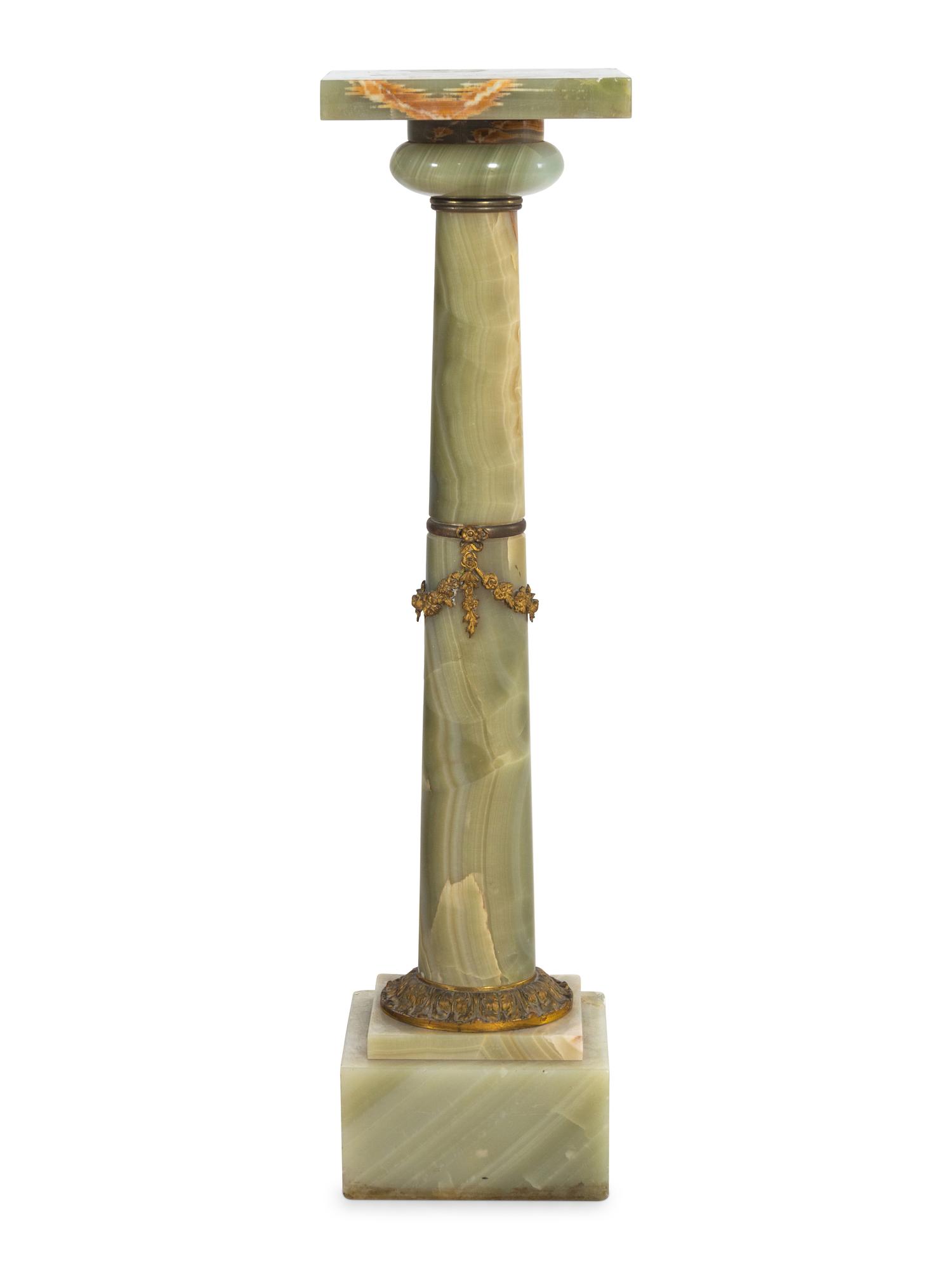 A Continental Gilt Bronze Mounted Onyx Pedestal