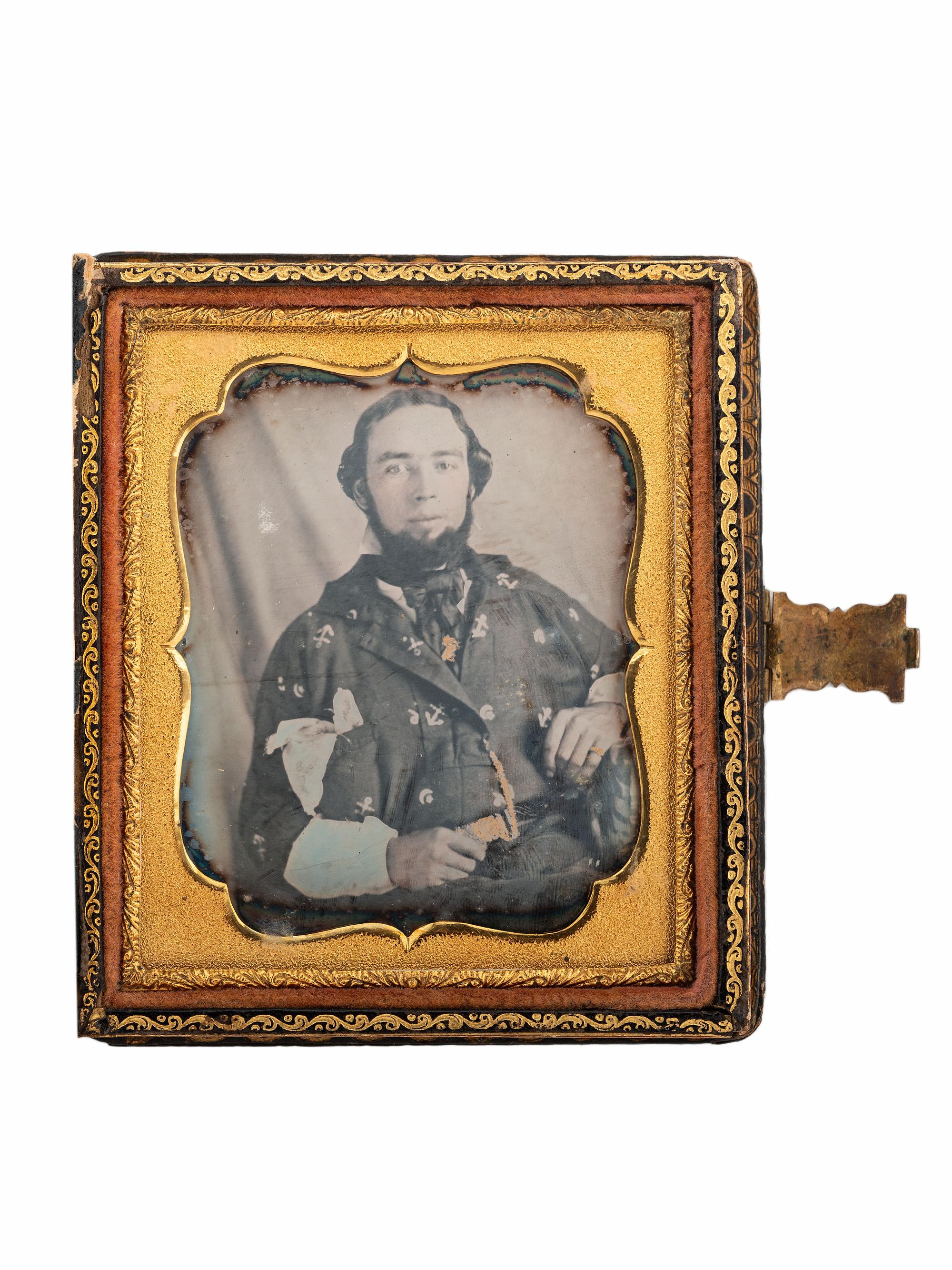 [MINING - EARLY PHOTOGRAPHY]. Sixth plate daguerreotype of a gold miner wearing a shirt adorned with anchors, moons, and stars.