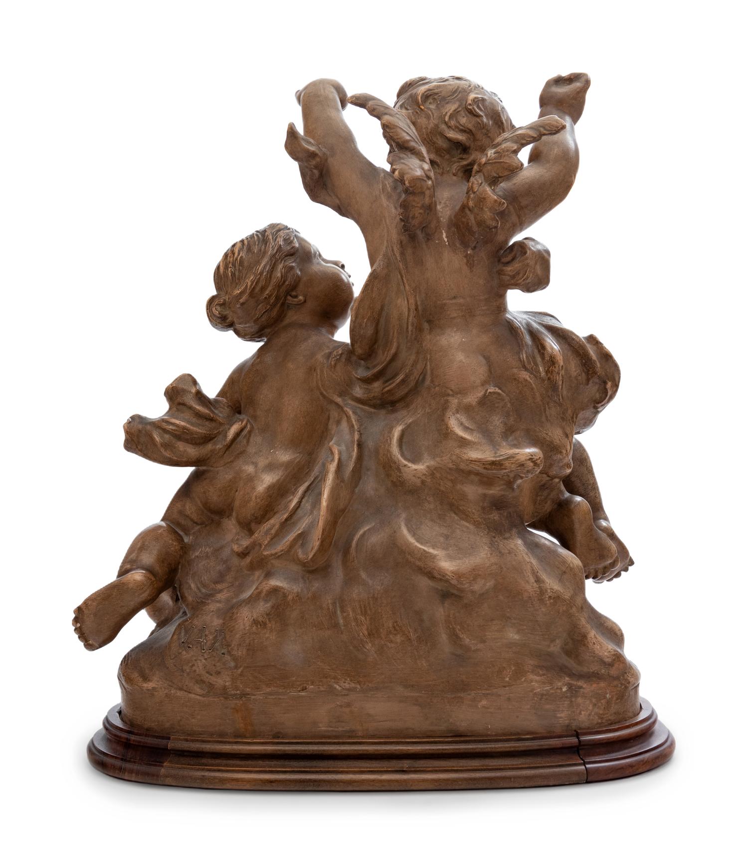 A Louis XV Style Terra Cotta Figural Group