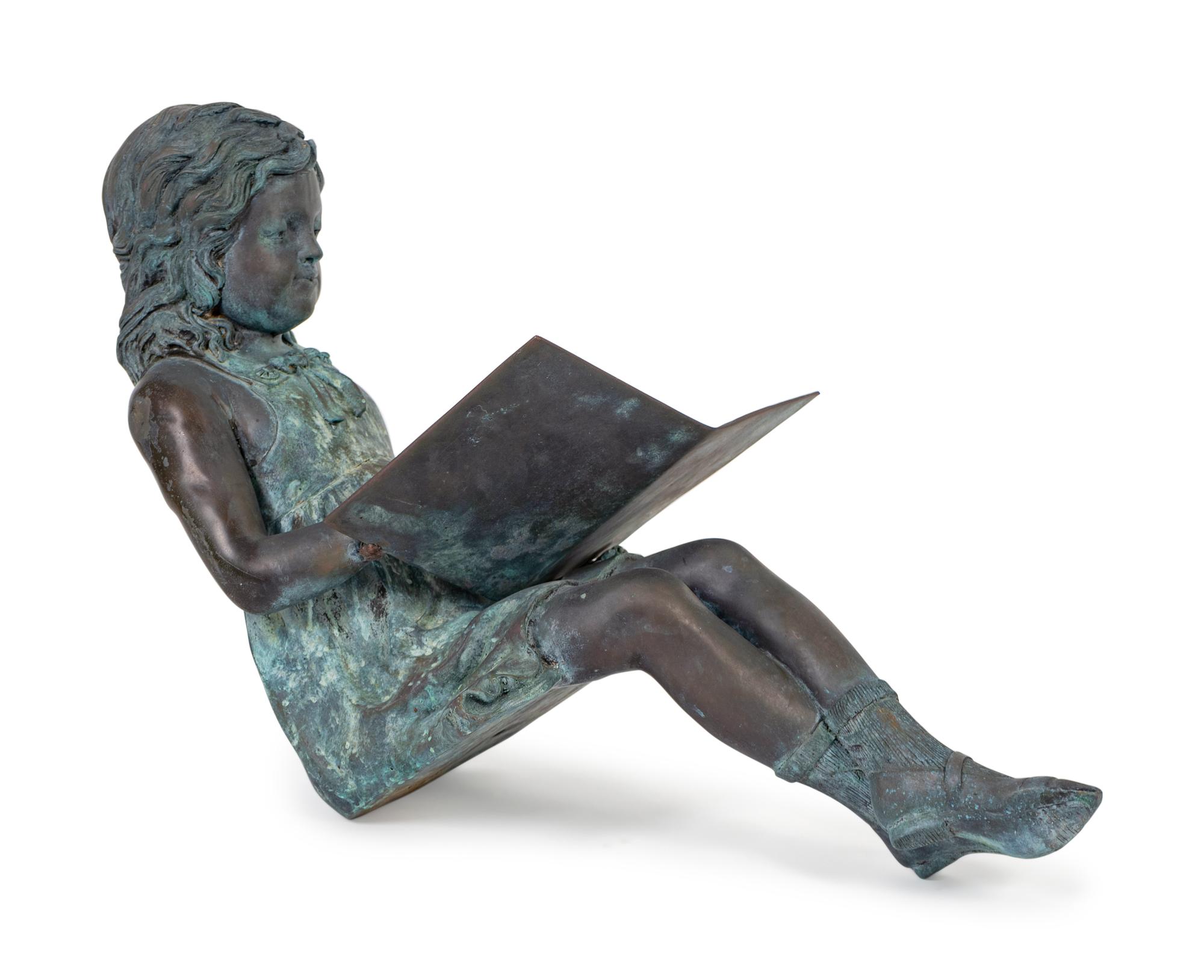 A Bronze Figure of a Young Girl Reading a Book — 20TH CENTURY