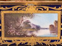 A Sèvres Style Painted and Parcel Gilt Porcelain Table Casket