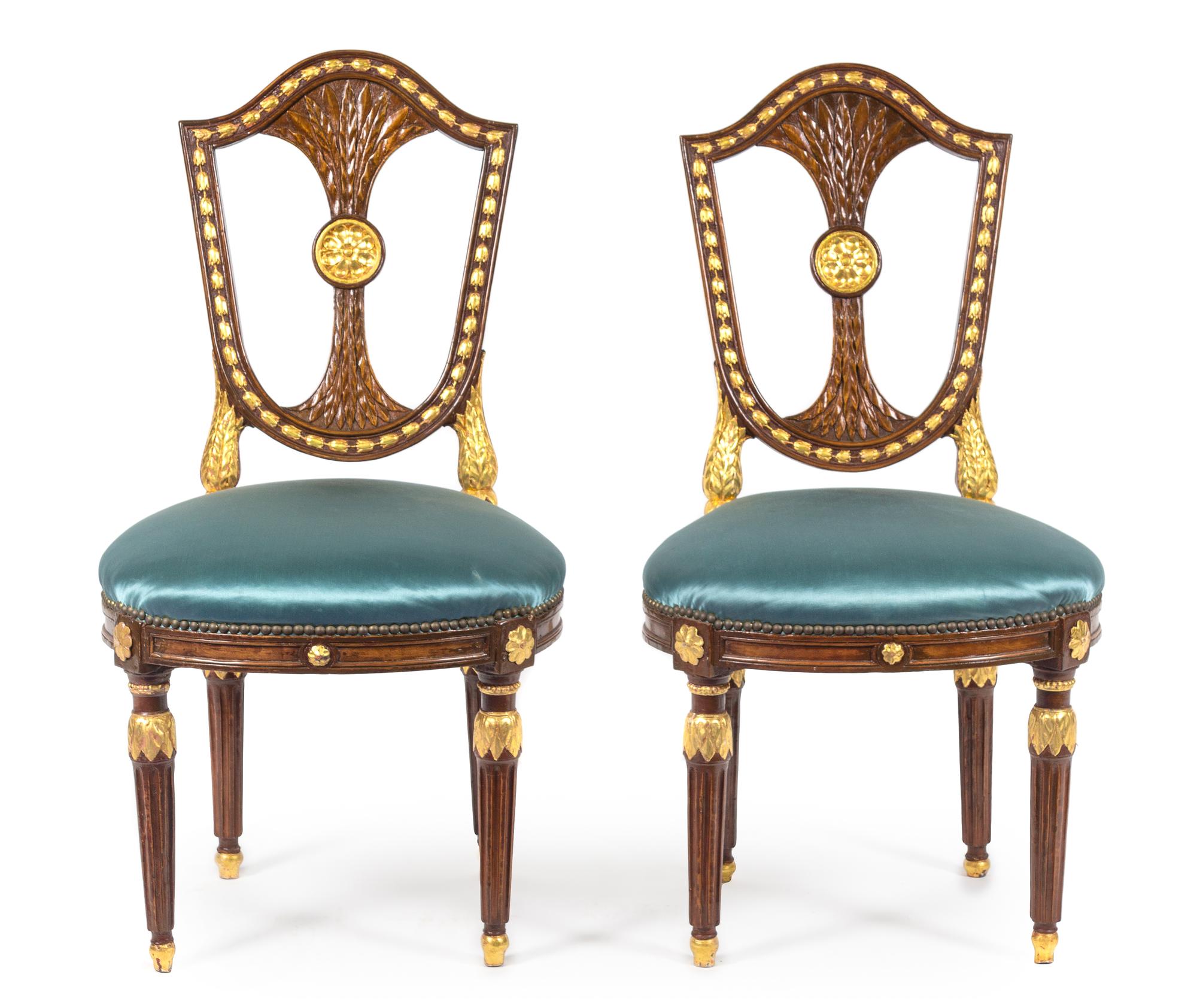 A Pair of Russian Neoclassical Parcel Gilt Mahogany Side Chairs Height 39 1/2 inches. — CIRCA 1780