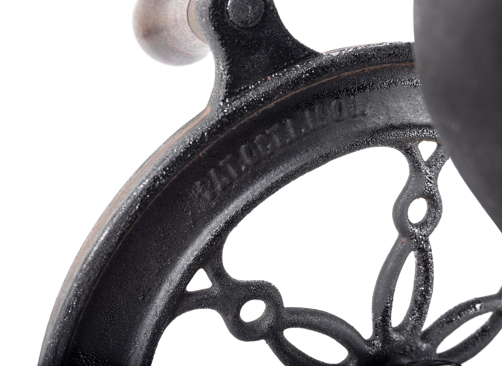 A Landers, Frary & Clark Cast Iron Coffee Mill with an Eagle Finial