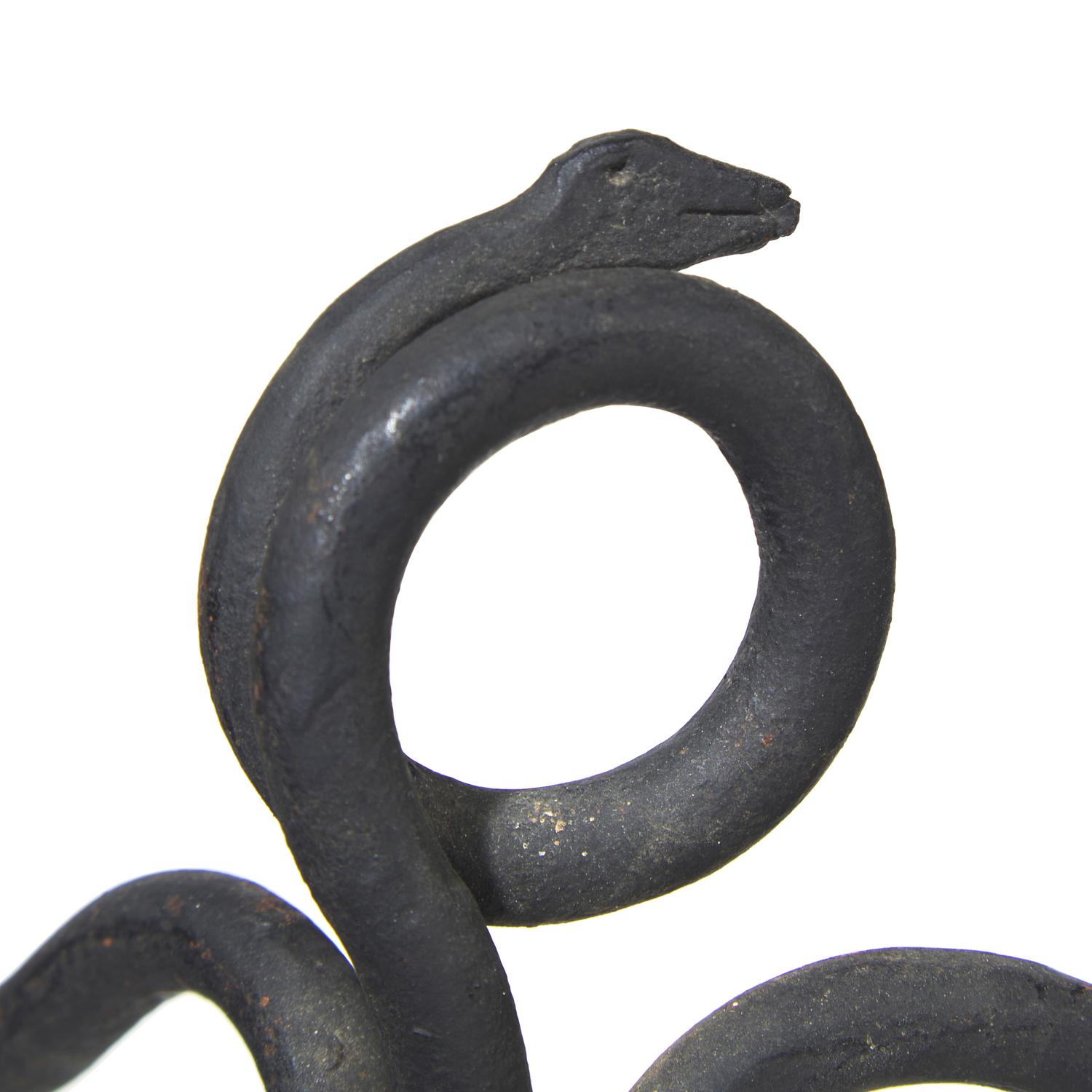 A Group of Four Arts and Crafts Wrought Iron Fireplace Tools