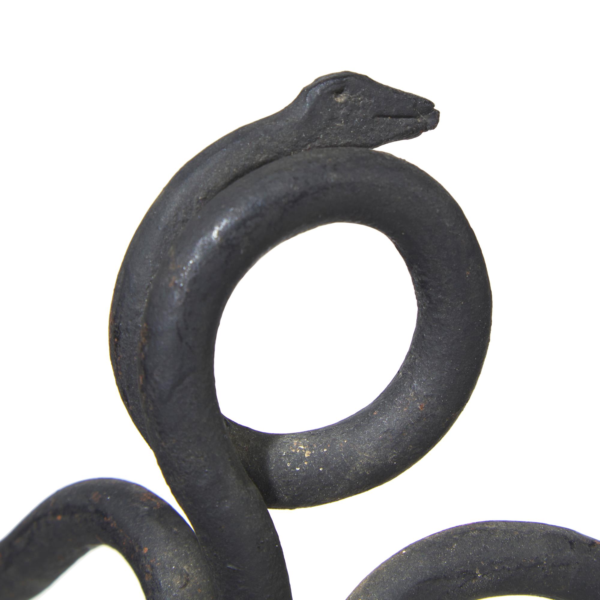 A Group of Four Arts and Crafts Wrought Iron Fireplace Tools