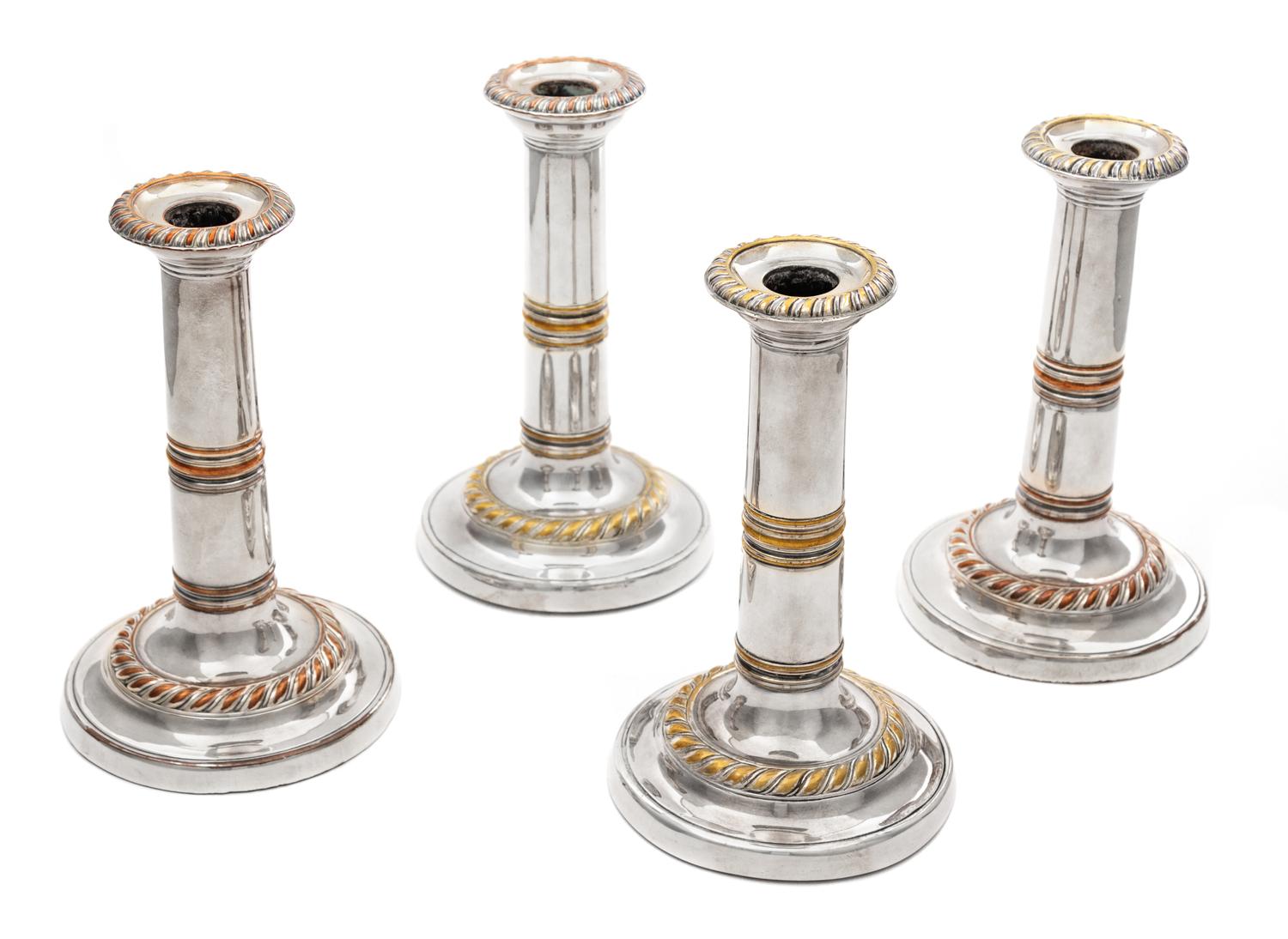 A Set of Four Regency Silver-Plate Candlesticks