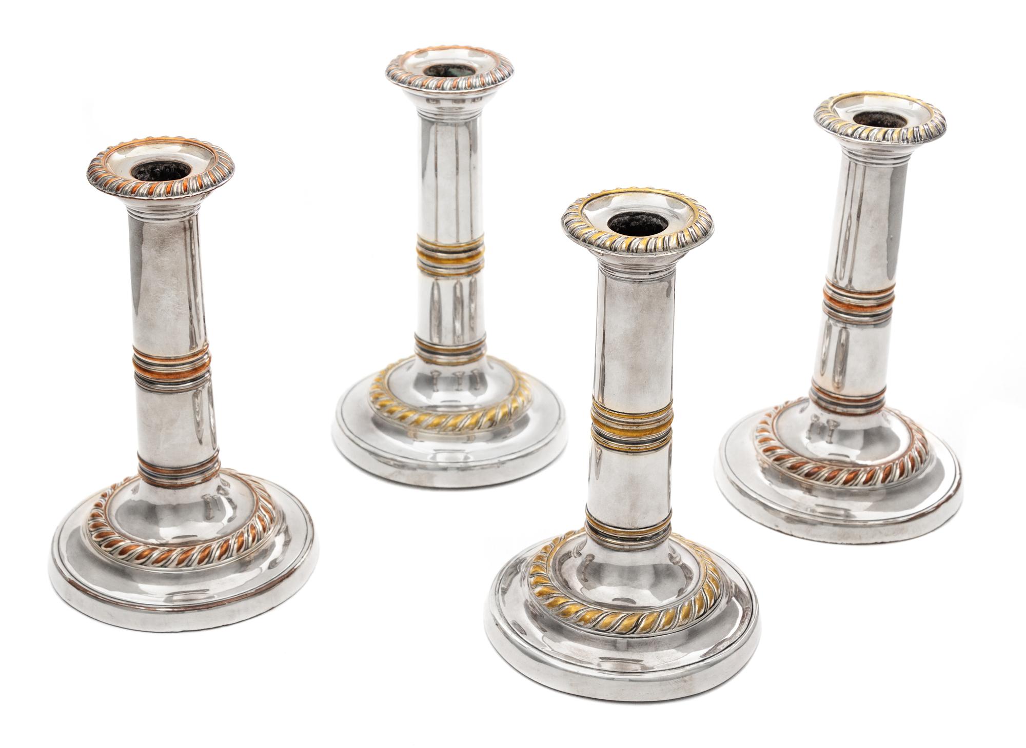 A Set of Four Regency Silver-Plate Candlesticks