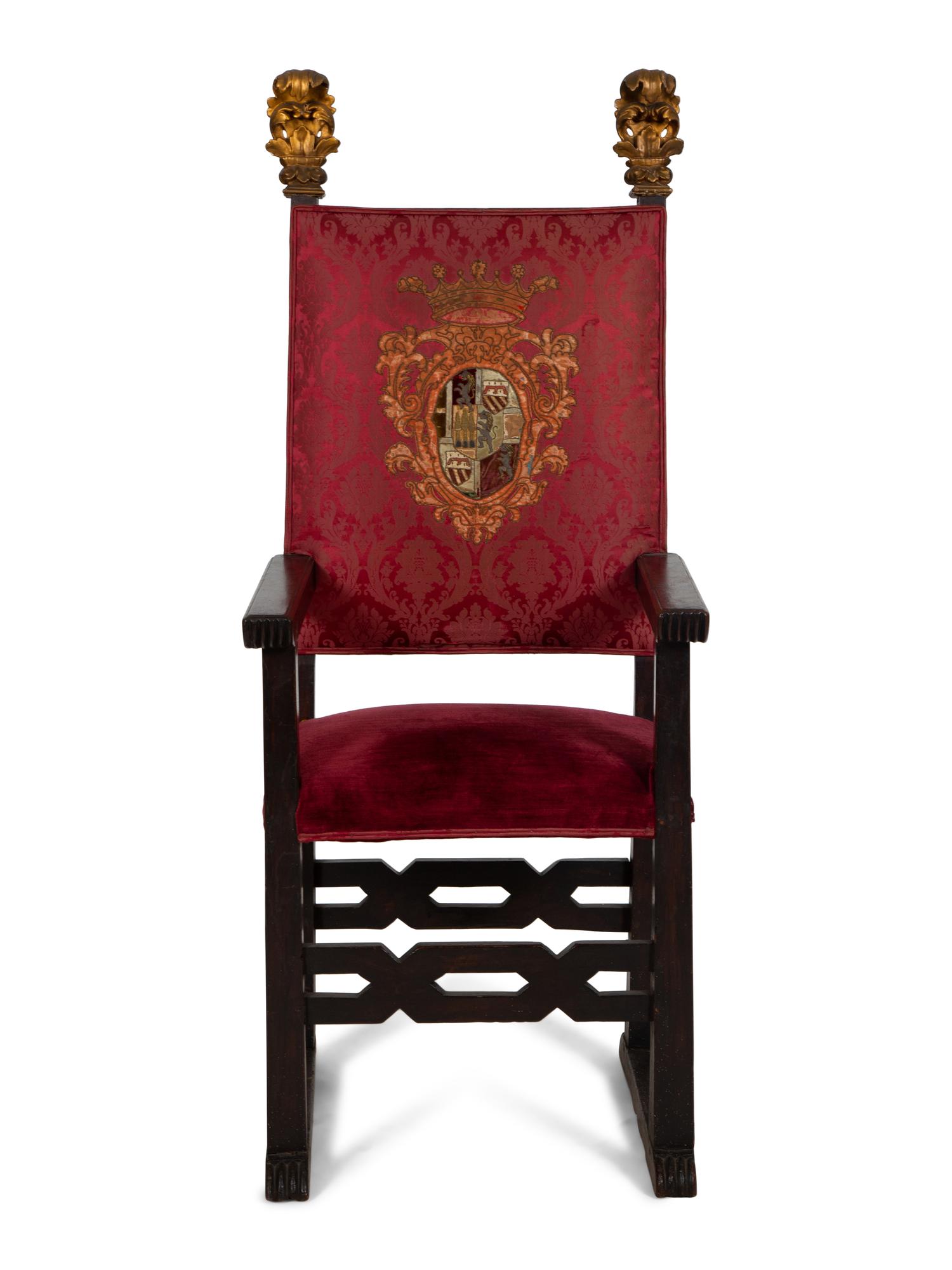 An Italian Baroque Style High Back Arm Chai r