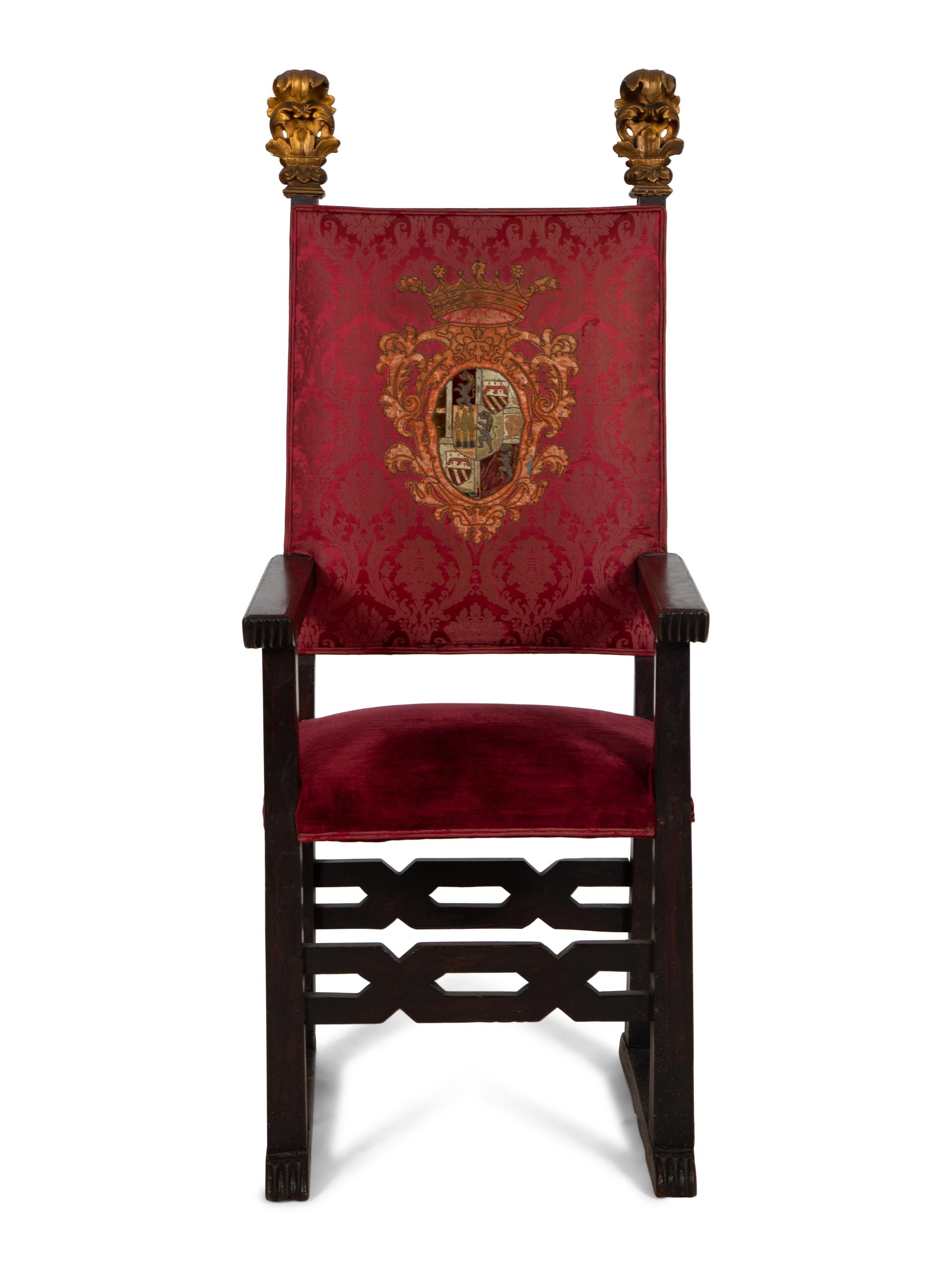 An Italian Baroque Style High Back Arm Chai r
