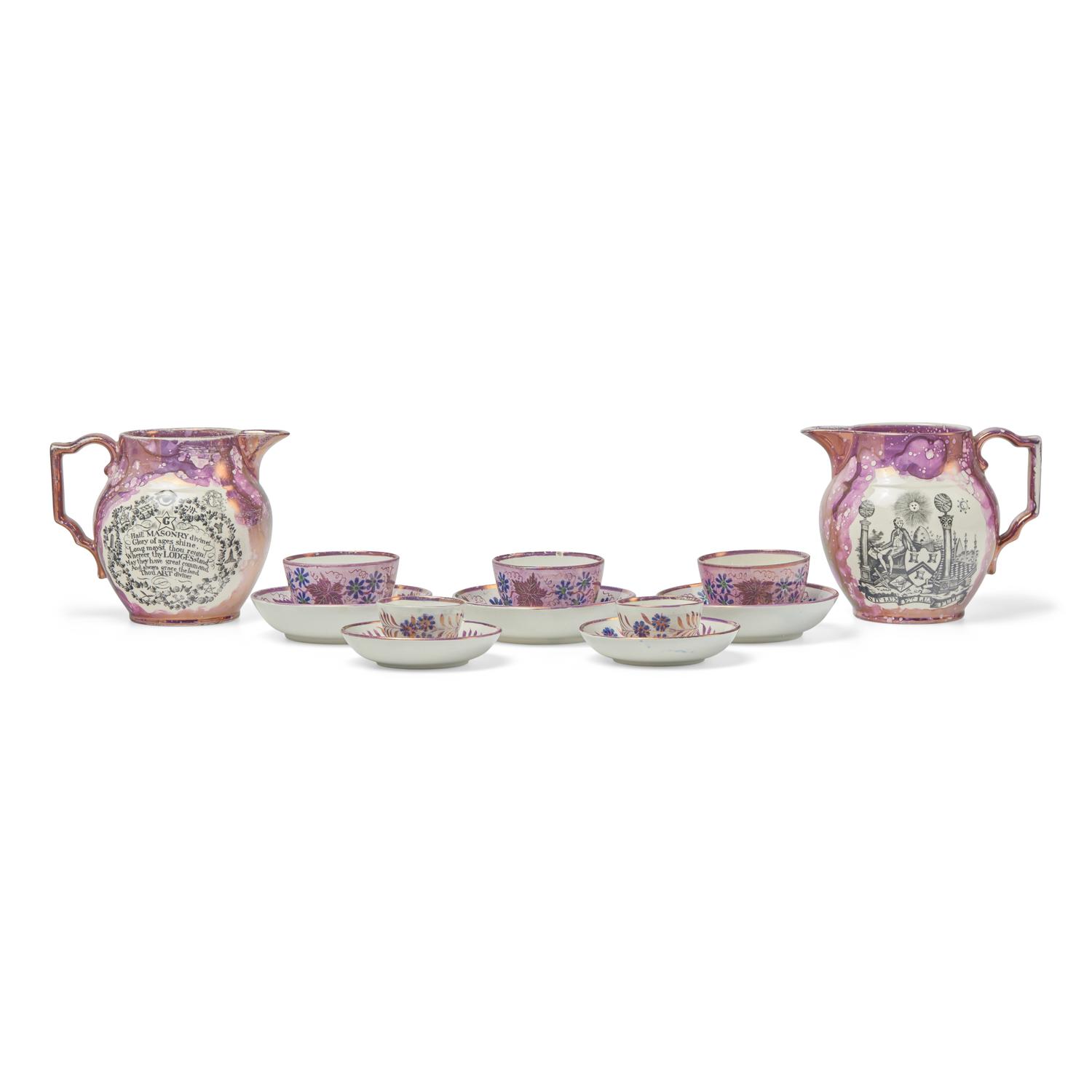 A Pair of Staffordshire Pink Sunderland Lustreware Masonic Water Pitchers, Together with Five Tea Bowls and Saucers