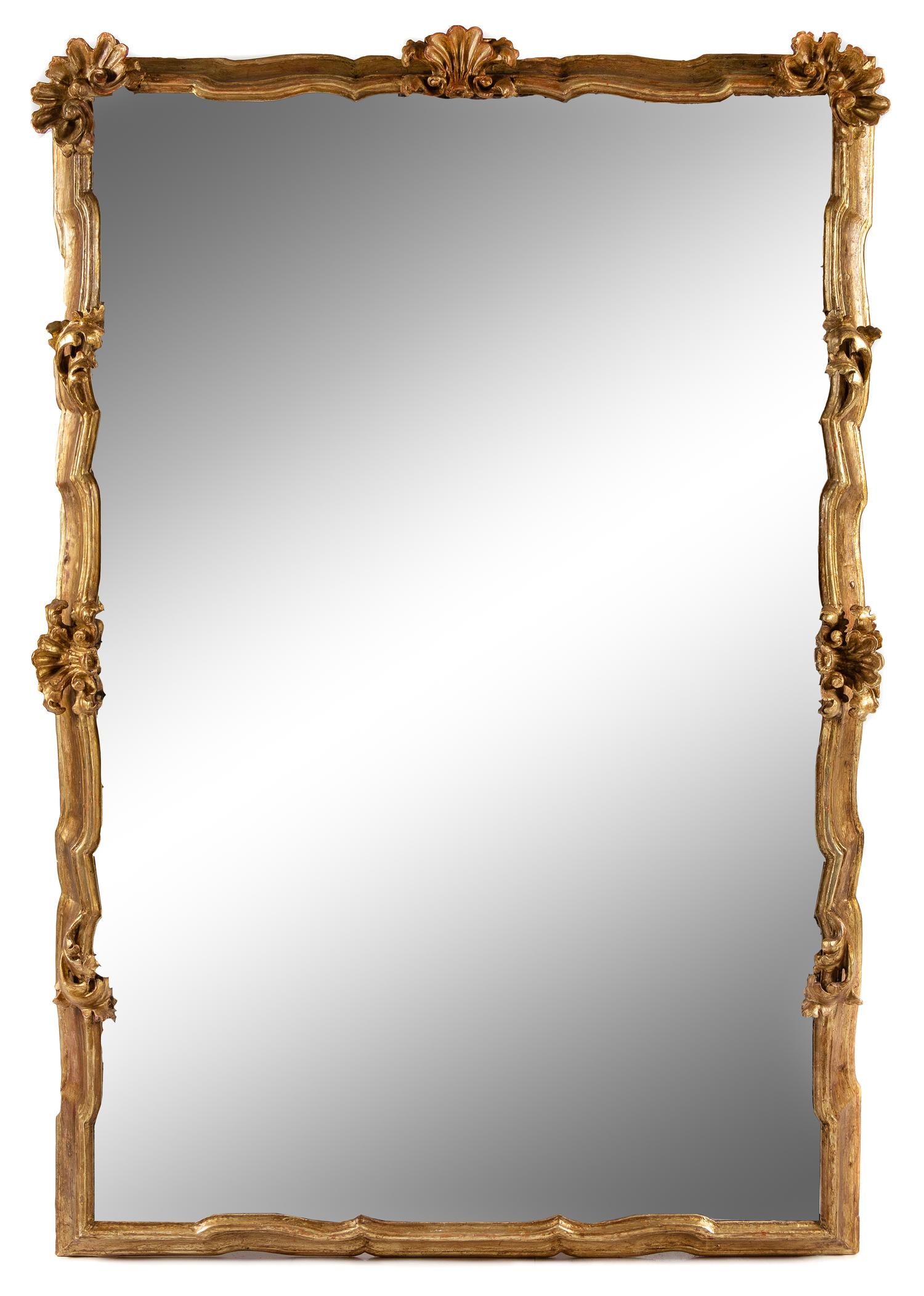 An Italian Baroque Style Giltwood Mirror Height 84 x width 54 inches. — 18TH/19TH CENTURY
