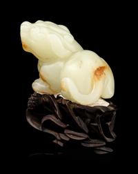 A Carved Russet and White Jade Figure of Mythical Beast, Tianlu