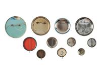 [KING, Martin Luther, Jr. (1929-1968)]. A group of 11 pinback buttons related to Martin Luther King, Jr., SCLC, and CORE.