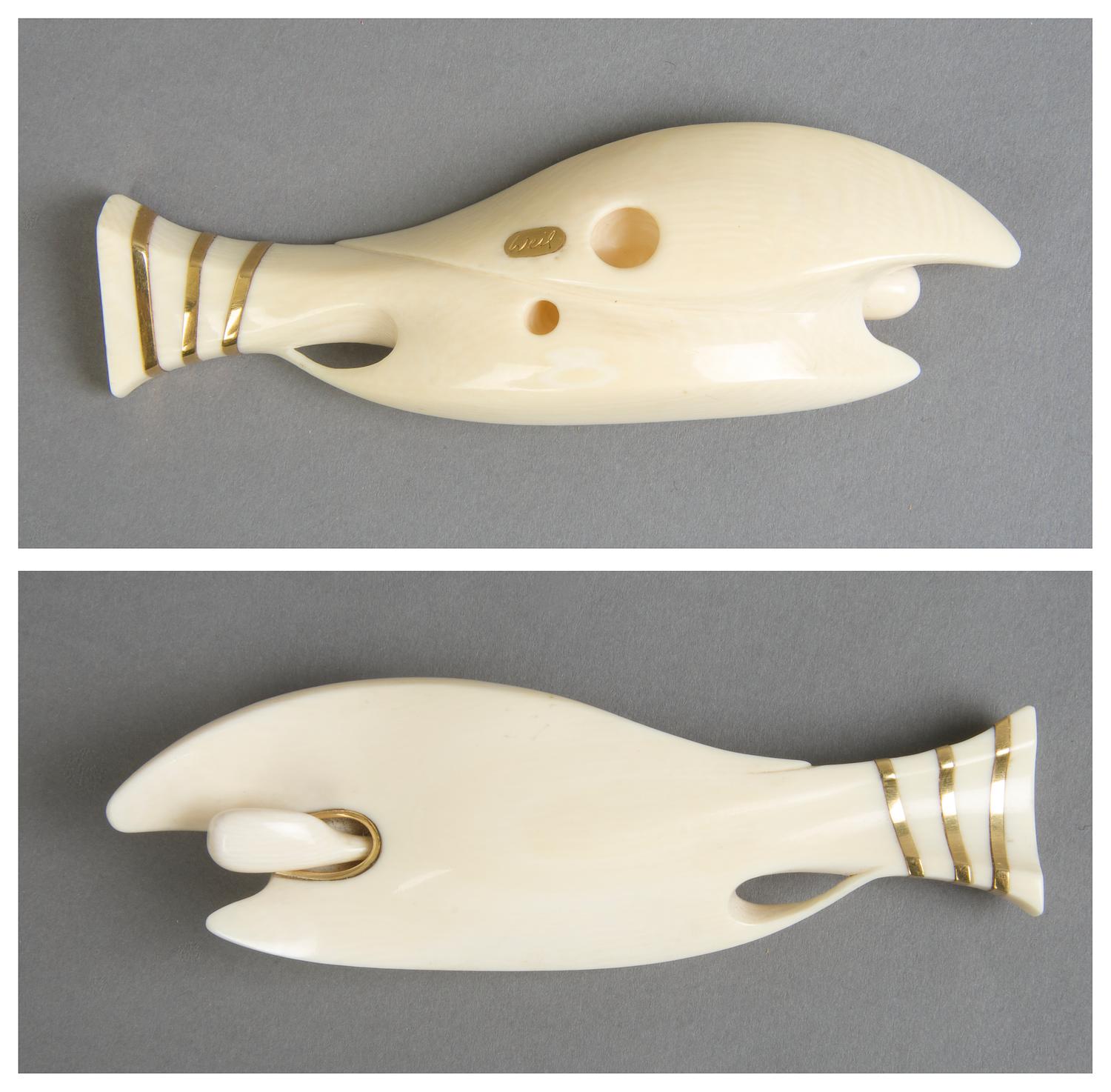 An Ivory and Gold Netsuke, George Weil, Length 4 1/4 inches.