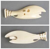 An Ivory and Gold Netsuke, George Weil, Length 4 1/4 inches.