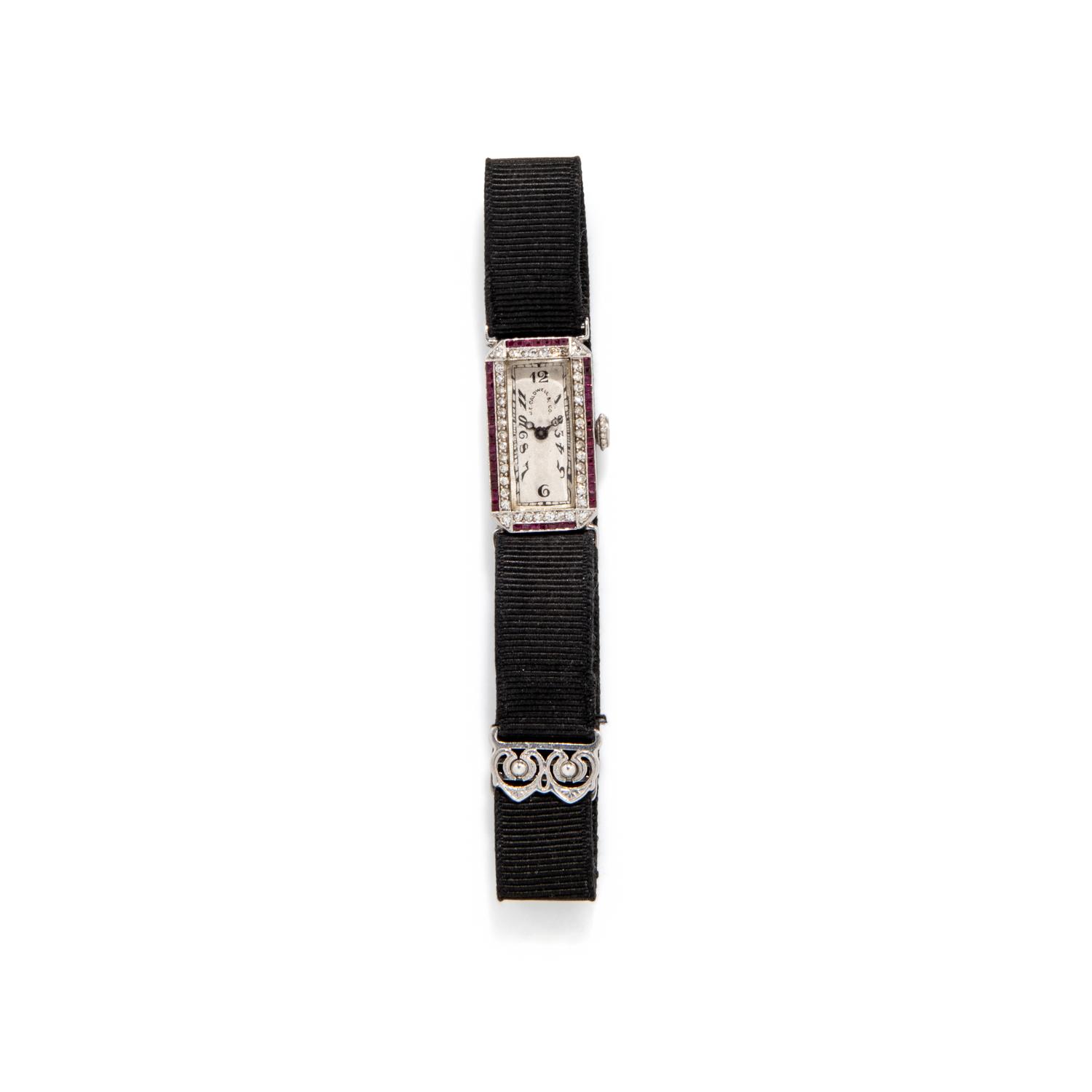 J.E. CALDWELL, PLATINUM, RUBY, AND DIAMOND WATCH